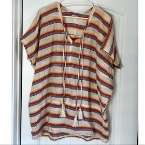 Multi colored shirt with tassels